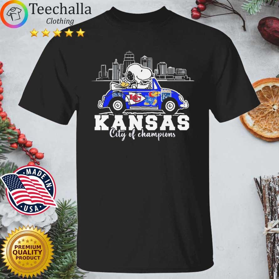 Snoopy and Woodstocks driving car Kansas City Of Champions Sporting Chiefs Jayhawks and Royals shirt